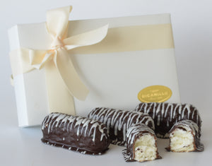 CHOCOLATE COVERED ANGEL FOOD  FINGER CAKES WITH WHITE DRIZZLE